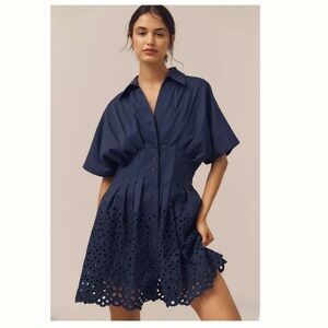The Tobie Button-Front Pleated
Mini Shirt Dress by Exquise